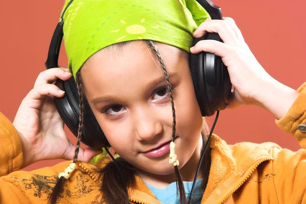 depositphotos_3616103-stock-photo-child-listening-music-in-headphones.jpg